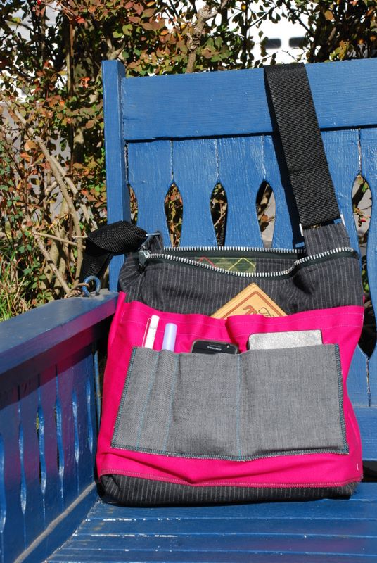 Black and pink messenger bag
